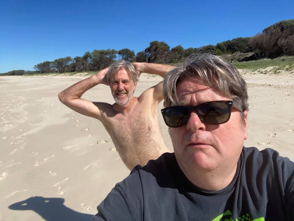 Dave and Glenn at the beach taking a photo